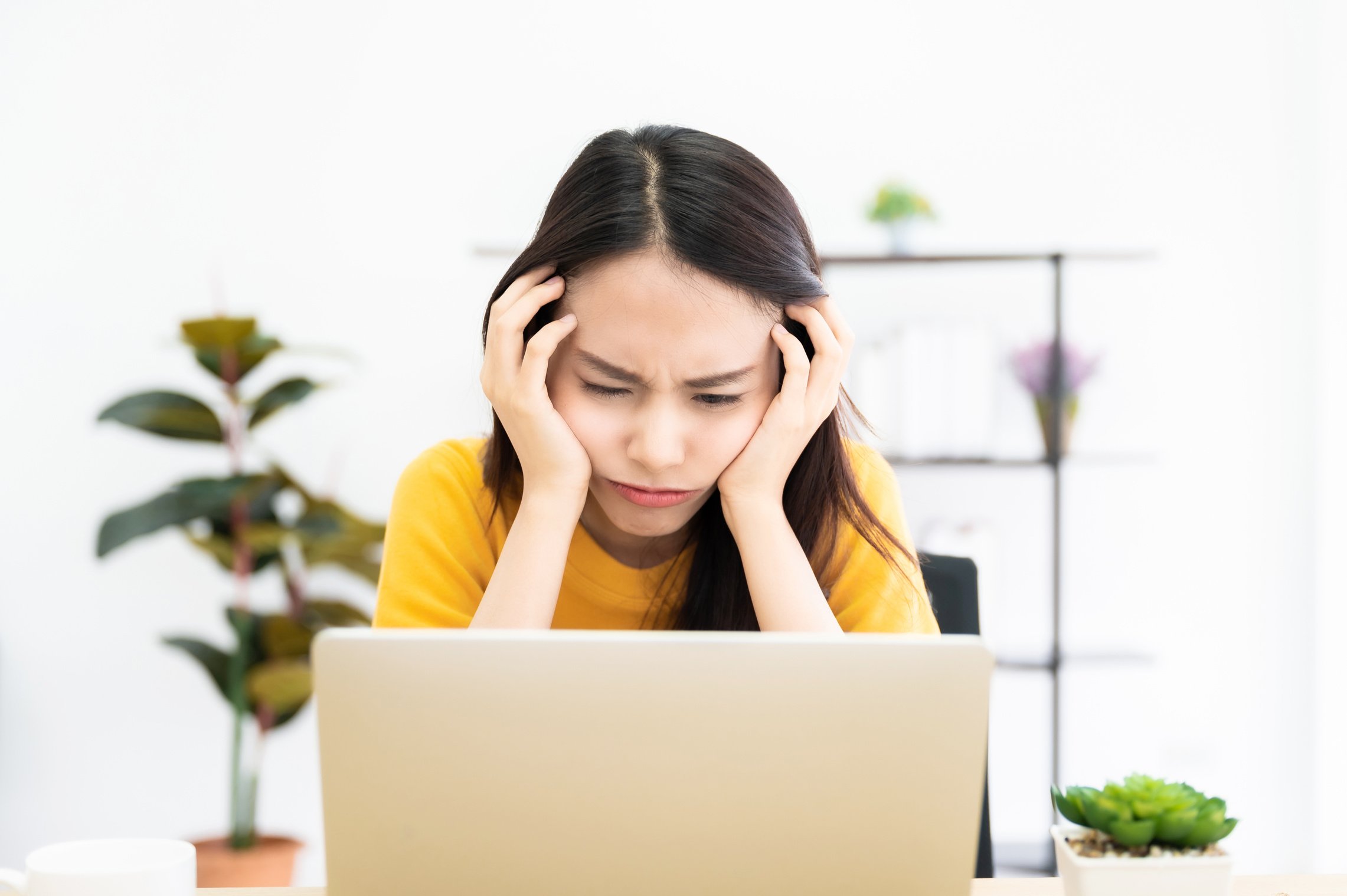 Young Woman Confused with Work